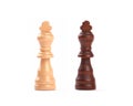 Detailed photo of two chess pieces, kings, black and white. Isolated on white background