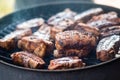 Detail of BBQ pork ribs grilling