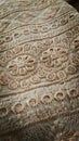 A detailed picture of Indian fabric and showing floral embroideries done by Indian workers. Royalty Free Stock Photo