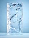 Detailed Rectangular Ice Block Structure on Light Blue Background Displayed in Studio Royalty Free Stock Photo