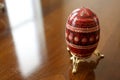 Detailed Red Pysanky Ukrainian Easter Egg on a Gold Stand