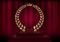 Detailed round golden laurel wreath crown award on velvet red curtain background and stage podium. Gold ring frame logo. Victory Royalty Free Stock Photo