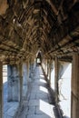 Detailed shot of an ancient corridor adorned with a stone vaulted ceiling