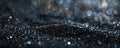 A detailed shot of black glitter with selective focus, highlighting the sharp, reflective particles Royalty Free Stock Photo
