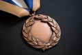 detailed shot of a bronze medal with laurel accents