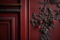 detailed shot of the carved woodwork on a victorian wardrobe door