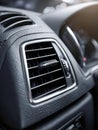 Close-up of car air vent with textured dashboard design Royalty Free Stock Photo