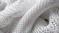 Detailed shot highlights the intricate abstract waves texture of white soft fabric, revealing a porous texture and round fiber