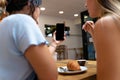 Detailed shot of two young women making a video call, speaking in sign language Royalty Free Stock Photo