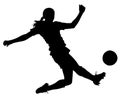 Detailed Sport Silhouette - Female or Woman Soccer Player Kicking at Goal Royalty Free Stock Photo