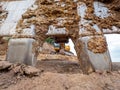 Detailed steel teeth of excavator bucket. Scarry bucket teeth