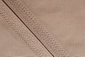 Detailed stitching of Kandura, the ankle-length garment