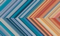 Detailed striped dual geometric pattern composed of big amount of thin orange and blue stripes