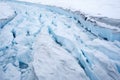 detailed textures of the ice on a crevassed glacier