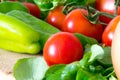 Detailed tomatoes with green pepperoni and salad