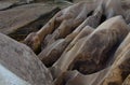 Detailed view of amazing shaped sandstone rocks. Typical geologic formations of Cappadocia. Abstract nature landscape Royalty Free Stock Photo