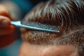 Close-up of a barber\'s skilled hands crafting a perfect hairstyle