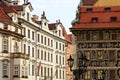 A detailed view of the beautiful House at the Minute on the right, located near the Old Town Square in Prague