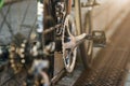 Detailed view of bicycle mechanisms. Sprocket, pedal and chain on a mountain bike Royalty Free Stock Photo