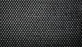 A detailed view of a black and silver woven metal pattern Royalty Free Stock Photo