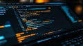 Detailed view of blue source code displayed on a computer monitor against a dark backdrop at a tech workspace