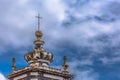 Detailed view of a catholic church top tower on medieval village Royalty Free Stock Photo