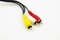 Detailed view of cinch connectors on audio and video with black cable Royalty Free Stock Photo