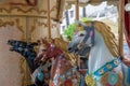 Detailed view of colorful horses from a vintage classic carousel Royalty Free Stock Photo