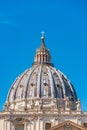 The detailed view of dome summit of Papal Basilica of St. Peter in the Vatican against blue sky Royalty Free Stock Photo
