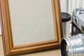 Detailed view of empty wooden photo frame and vintage camera Royalty Free Stock Photo