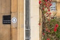 Detailed view of the entrance to a Cambridge University Masters` office.