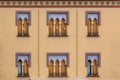 Detailed view of the exterior facade of a Moorish-style building, Arabic architecture with decorative elements, arabic multifoil