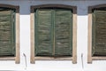 Detailed view of front facade parallel windows of typical traditional portuguese house Royalty Free Stock Photo