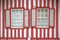 Detailed view of front facade windows of typical Costa Nova beach house, colorful striped wooden beach houses Royalty Free Stock Photo