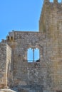 Detailed view of a gothic window, manuelino style, on interior ruins of the medieval Belmonte Castle, iconic monument building on