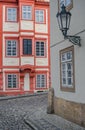 Detailed view of a historic lamp, buildings and a path in the center of Prague Royalty Free Stock Photo