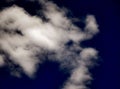 Detailed view of a large fleecy cloud, altocumulus, at an altitude of about 3000 to 6000 meters. It is a sign of unstable to come Royalty Free Stock Photo