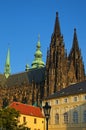 Detailed view of medieval Saint Vitus Cathedral against blue sky. It is the largest church, located in Prague Castle Royalty Free Stock Photo