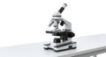 A close up shot of a white and black microscope on a white surface table top Royalty Free Stock Photo