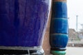 Detailed view of mighty dark blue ceramic columns of the artist Hundertwasser