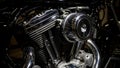 Closeup of a shiny motorcycle engine with chrome pipes and black cylinders Royalty Free Stock Photo