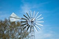 Detailed view of a newly installed, all metal renewable energy windmill showing some of the blades. Royalty Free Stock Photo