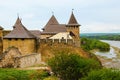 Detailed view of oldl castle in the bank of Dnister River. Ruins of fortifications. High stone walls with massive towers.