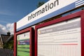 Detailed view of a railway timetable seen on the platform of the famous Leeds to Carlisle rail route.