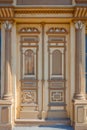 Detailed view of richly shaped wooden door