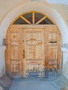 Detailed view of a richly shaped wooden door