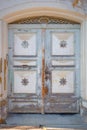 Detailed view of a richly shaped wooden door