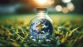 A detailed view of a small Earth contained within a plastic bottle, placed on a background of grass, highlighting