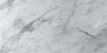 A detailed view of a smooth white marble surface. This image can be used for various purposes, such as backgrounds Royalty Free Stock Photo