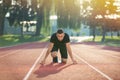 Detailed view of a sprinter getting ready to start. Selective focus. Royalty Free Stock Photo